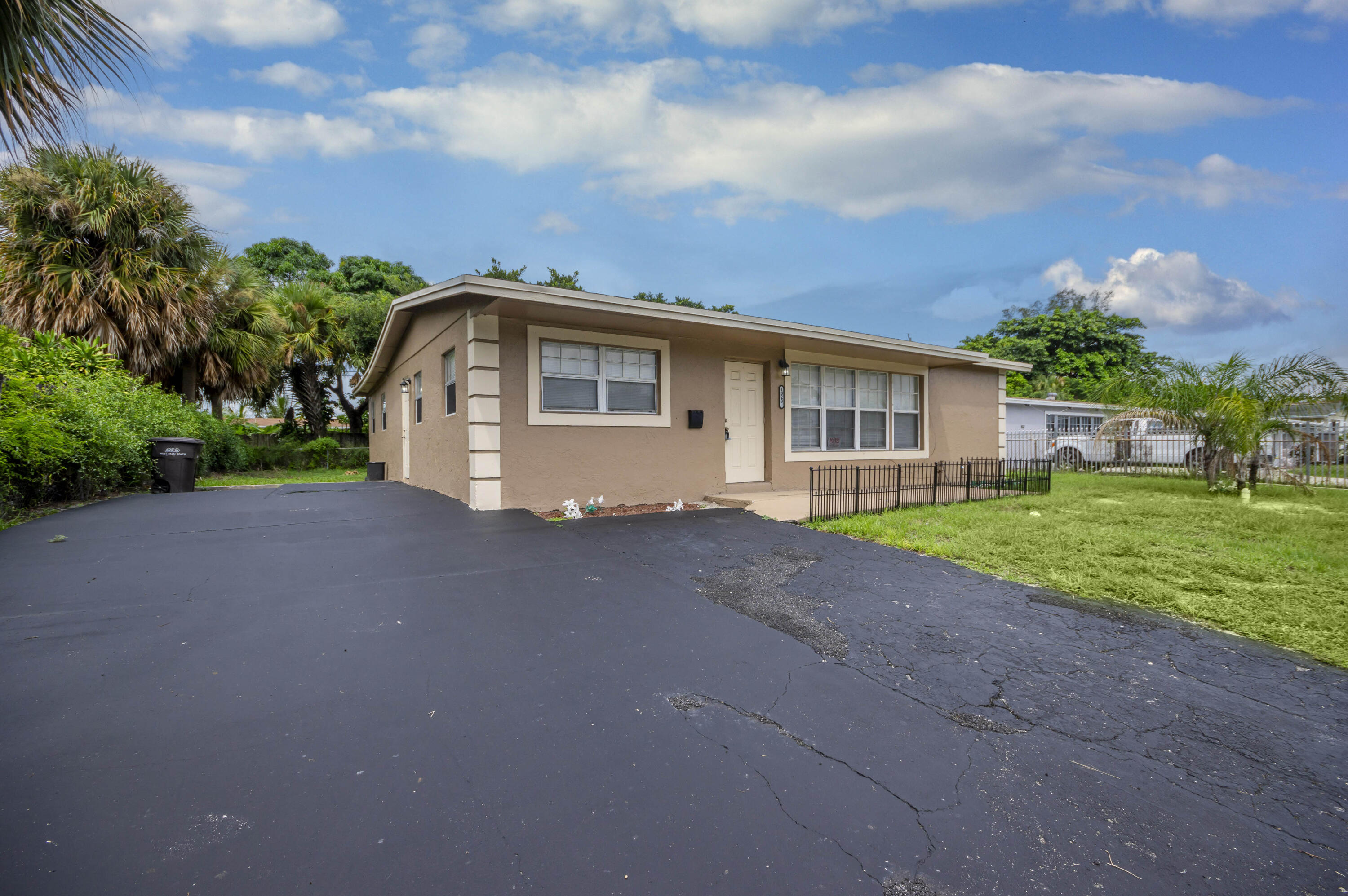 A wonderful opportunity in a fantastic location! This home features a practical traditional layout with a clear flow from the living room to the kitchen and breakfast nook. It offers four rooms total: two on one side and two larger rooms on the other, providing excellent flexibility for your needs. The massive, private backyard is the star of the show, offering plenty of space for a pool, addition, or anything you can imagine. Home has a 2019 Roof. Just minutes to downtown, outlet shopping, and highways. Ideal for an investor or a buyer ready to make it their own!