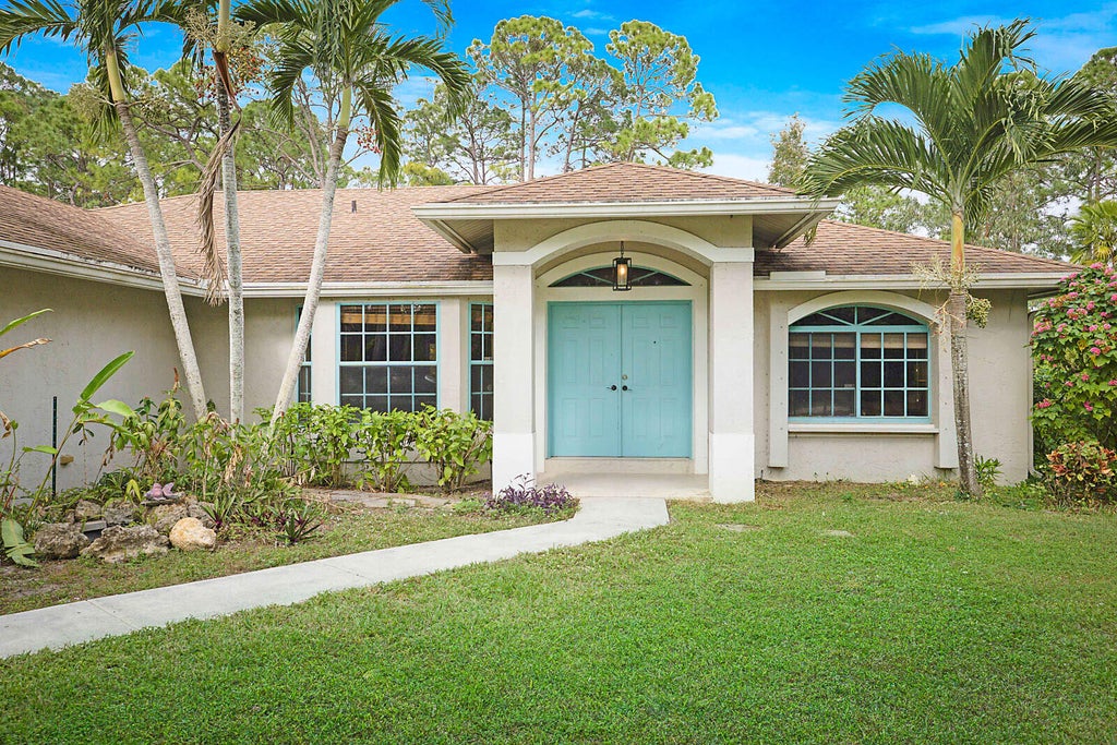 Photo of 13425 78th Place N, The Acreage, FL 33412 (MLS # R11048557)