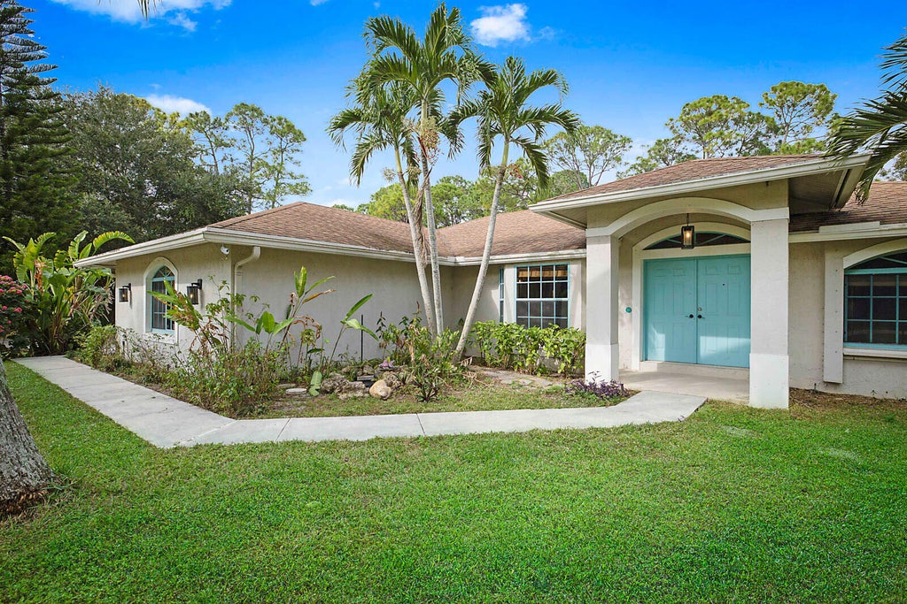 Photo of 13425 78th Place N, The Acreage, FL 33412 (MLS # R11048557)