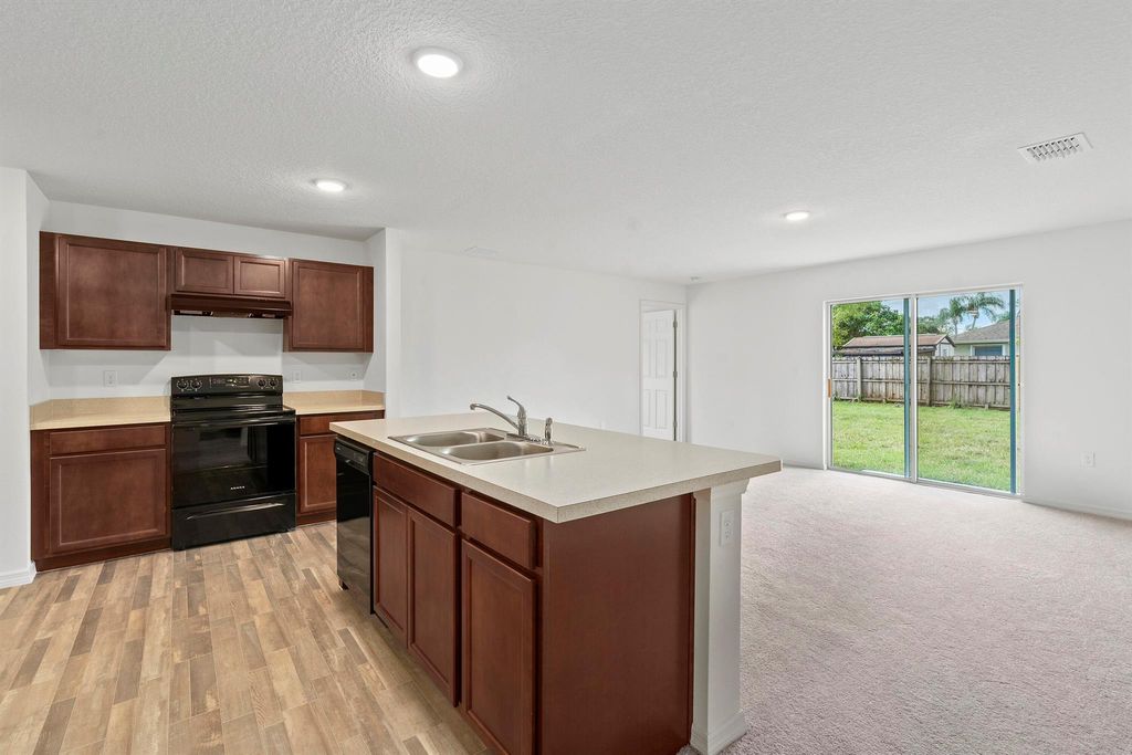 Photo of 740 SW Avens Street, Port Saint Lucie, FL 34983 (MLS # R11124816)