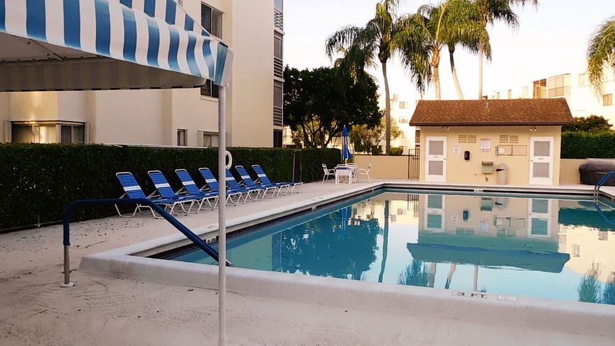 Beautiful 2 Bedroom, 2 Bath, condo, in an amazingly quiet 55 plus community, boasting an open floor plan, kitchen has pass through to formal dining room, which opens to the living room. Living room overlooks oversized balcony that provides surreal view of plush landscaping overlooking the pool. Enjoy the oversized master suite, with full bath, large walk-in closet, and access to balcony with relaxing, beautiful views. Washer and dryer are included, Ac has been replaced as well as water heater, and newer storm shutters make storm preparation a breeze. Worried about the stairs, no need it has an elevator and trash shute! Located in the heart of Palm Beach, shopping, entertainment, airports, and pristine beaches are minutes away. Do not miss this, it will sell fast!