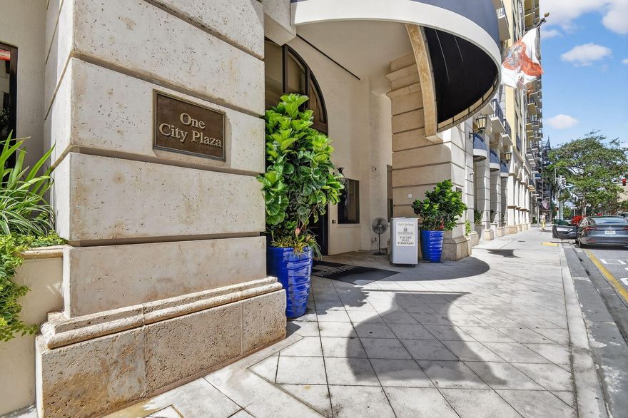 Newly renovated 2 story 1/1.5 condo in trendy One City Plaza in downtown Cityplace, boasts 26' ceilings & 2 story windows (electric shades) fills the space with natural light. Main level features open kitchen, spacious living and dining areas and powder room. Spiral staircase opens to 2nd level Master suite, spacious built-in California closets. Master bath has dual sinks, large soaking tub, separate walk in shower. Intracoastal view off side of balcony. Garage parking space outside unit. Residents enjoy 24/7 security, front desk attendant, valet parking for guests, rooftop heated pool with views of the Intracoastal and Palm Beach Island. Walk to dinner, entertainment and the beach. 10 min to PBI airport. Welcome home to Paradise! Price is firm.