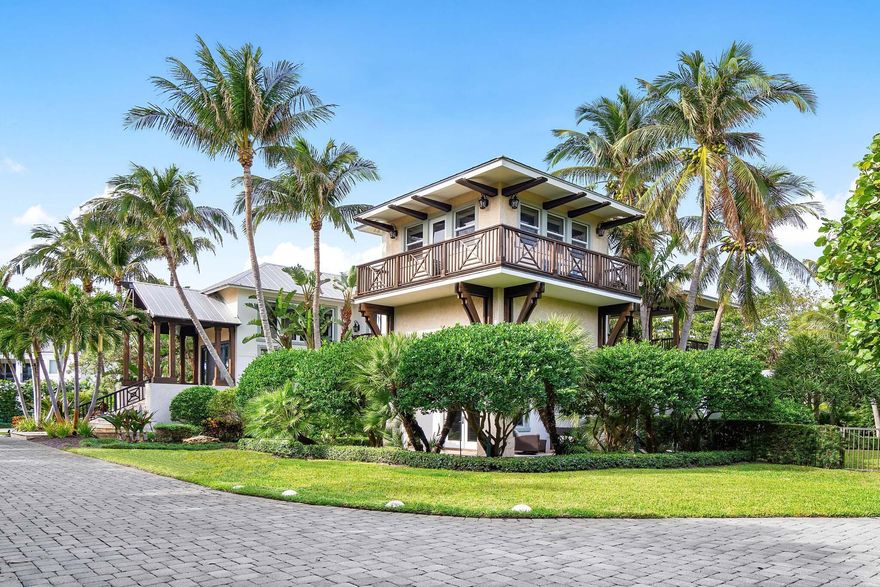 This private coastal estate includes a beach lot with over 140 feet of oceanfrontage. Situated on a quiet cul-de-sac, the gated compound boasts over 1.25 acres. The main house offers vaulted beamed ceilings; imported carved wood pillars; wide plank walnut floors; wraparound lanai; and sliders that invite indoor outdoor living. Other features include six total bedrooms; full-service kitchen with butler's pantry; primary wing; guest house with separate entry; and theatre room. Enjoy the tranquil grounds with coral stone pathways and terrace; heated saline pool with spa; and separate pavilion for outdoor dining and cooking. The beach parcel is located across Old Ocean Blvd with private deck and over 140 feet of direct oceanfrontage. There is truly nothing like this luxury compound. FEATURES:
" Two separate parcels 
" Gated and fenced compound is situated on over 1.25 acres
" One-third acre separate beach lot with over 140 feet of direct oceanfrontage and with private deck and stairway
" 6,120 square feet under air  |   10,171 total square feet
" 6 total bedrooms   |   6 full and 2 half baths
" Decorative driveway winds through manicured grounds with ample parking
" Coral stone front portico and double-door entry
" Abundant light throughout and vaulted cathedral beamed ceilings that accentuate the open floor plan 
" Wide plank walnut hand scraped wood flooring
" Living room with coral stone fireplace; important carved wood pillars from India; and flush sliders that open to a wrap-around lanai
" Dining area is located next to kitchen and opens to the lanai
" Full-service gourmet kitchen with Viking six-burner cook top; Sub Zero fridge and beverage center; custom cabinetry; Caesarstone countertops; and spacious Butler's pantry
" Theatre room
" Ground floor primary wing with private access to grounds and pool; large bath; and walk-in closets
" Four additional guest rooms in main house
" Manicured grounds with coral stone pathways and terrace
" Separate pavilion for cooking and alfresco dining 
" Resort style heated saline pool with spa; outdoor shower; and cabana bath
" Elevator
" Large laundry room and mud room with storage
" Guest house with separate entry; kitchenette, bath and laundry
" Three-car garage
" Complete hurricane rated windows and doors
" Full-house generator
" Scenic drive along A1A to boutiques and eateries of Delray Beach and Palm Beach
" Ocean Ridge offers dedicated town hall and police department

This truly is a one-of-a-kind coastal compound with private beach parcel. The expansive estate is perfect for private retreats and festive entertaining alike. The luxury lifestyle awaits at 4 Beachway North.