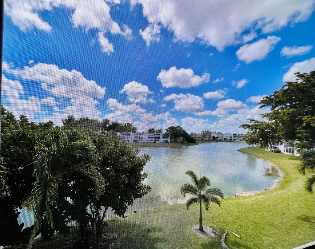 Photo of 314 Wellington D Cir, West Palm Beach, FL 33417 (MLS # B26002228)