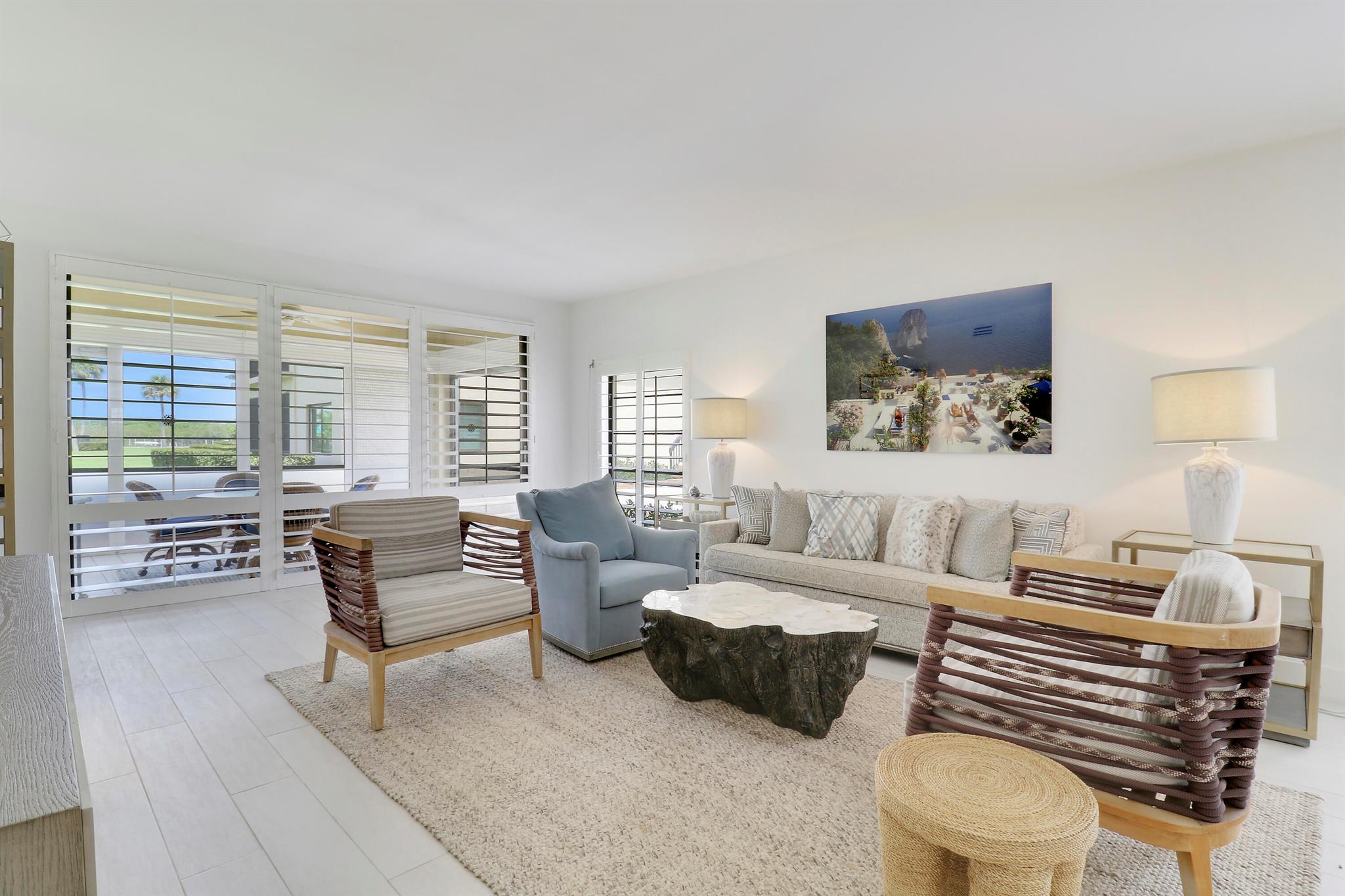 Jupiter Island Hideaway Beach access and Intracoastal. Boat dock slip 9, Kayak and paddleboard storage. Turnkey furnished. Community pool over looks the Intracoastal waterway. Jupiter Island is a barrier island just off the coast of Jupiter, featuring miles of pristine beaches, a small ship store, and no other commercial establishments. Cross the bridge, and you'll find yourself in the heart of restaurants, shopping, and everything you need--all within a one-mile walk.''