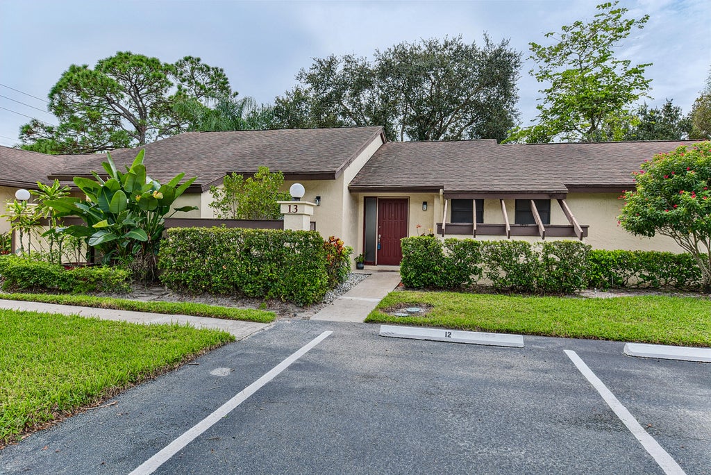 Photo of 13 Bay Cedar Court, Royal Palm Beach, FL 33411 (MLS # B26080733)