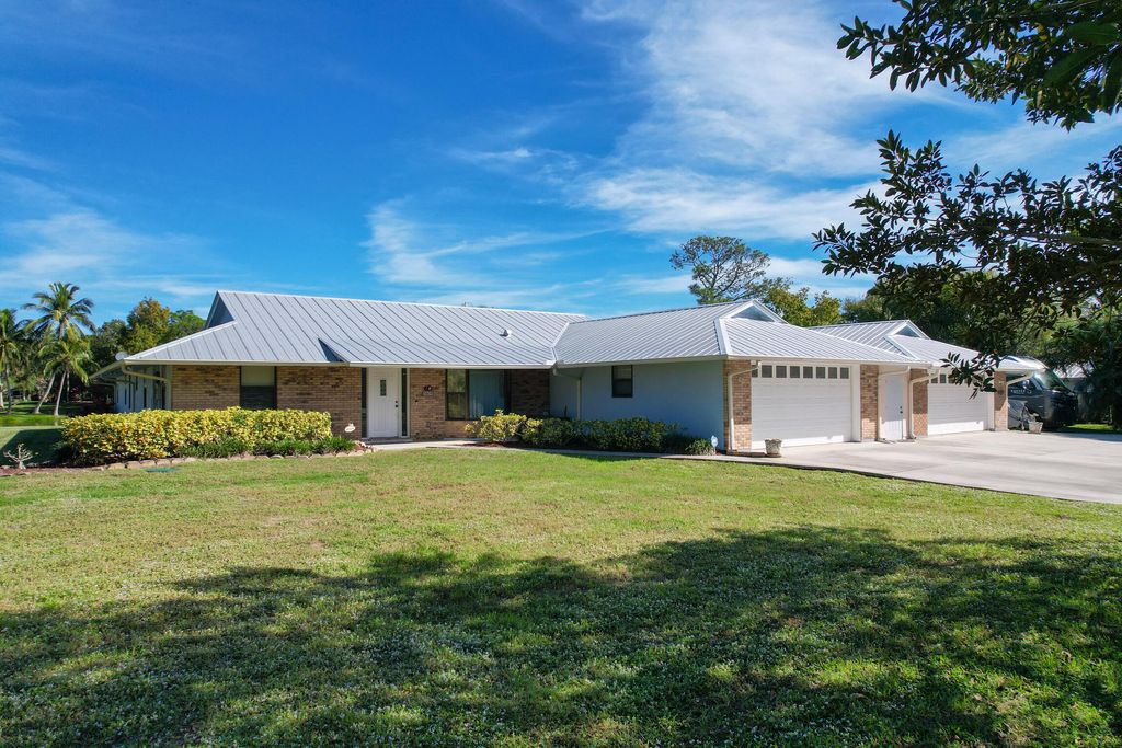 Photo of 5609 SE Lamay Drive, Stuart, FL 34997 (MLS # B26005769)