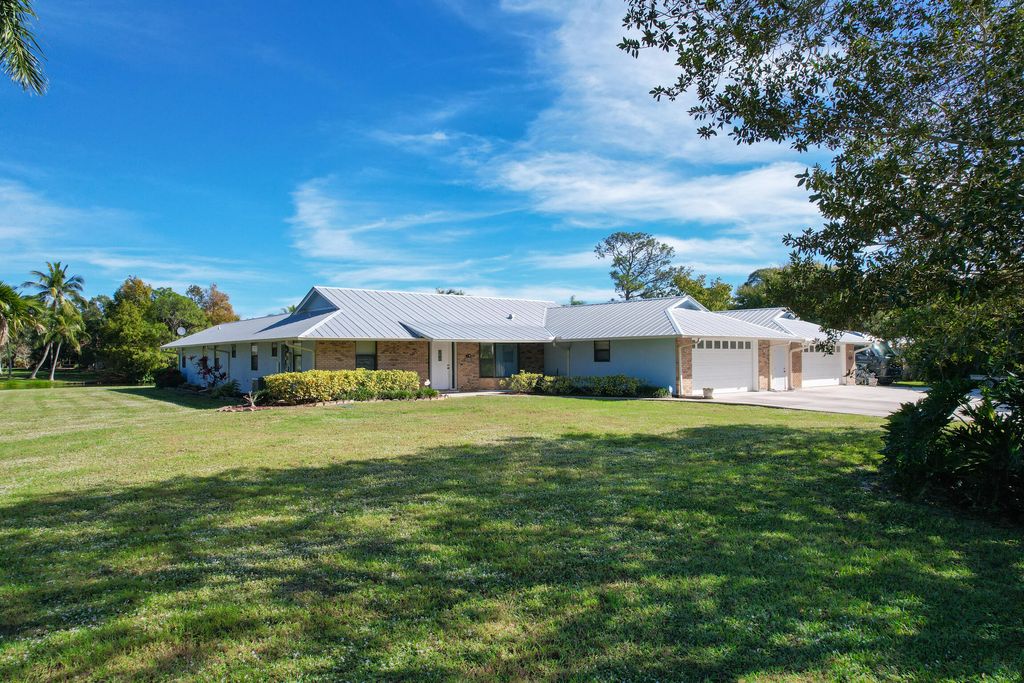 Photo of 5609 SE Lamay Drive, Stuart, FL 34997 (MLS # B26005769)