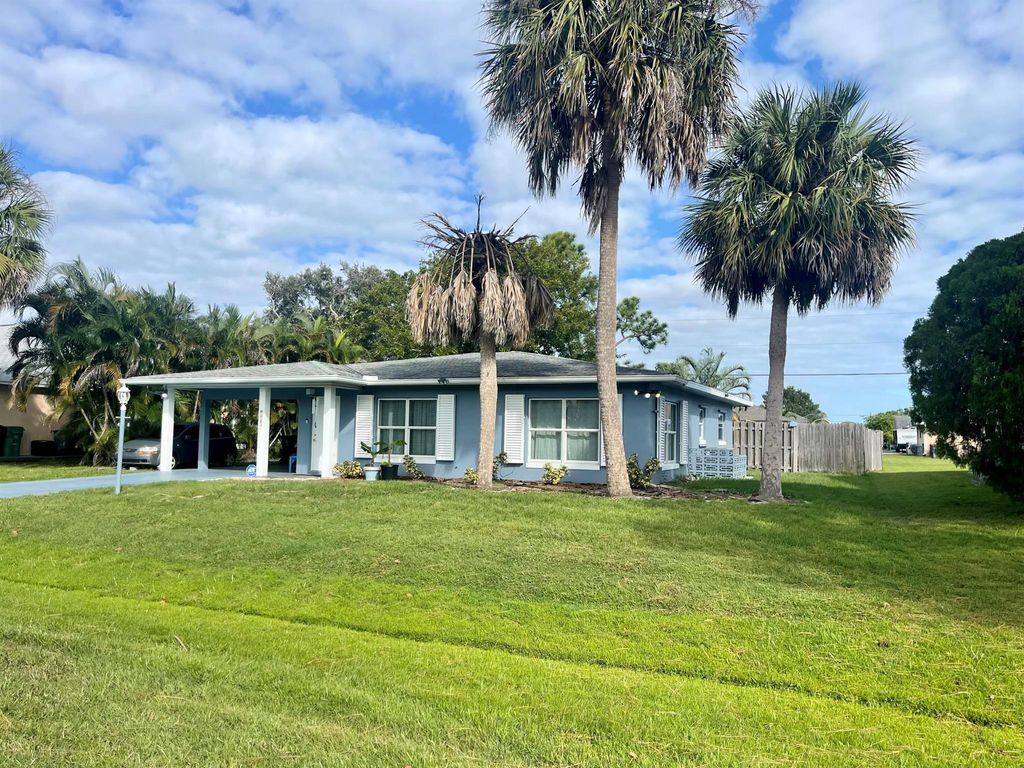 Photo of 525 NW Billiar Avenue NW, Port Saint Lucie, FL 34983 (MLS # R10930651)