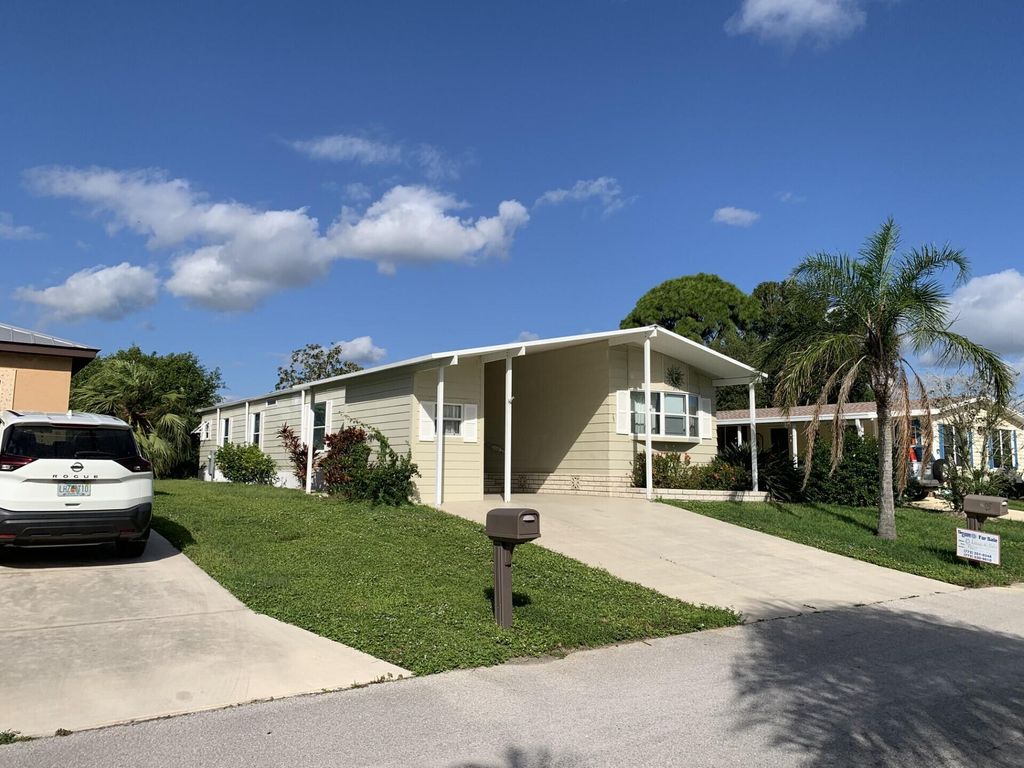 Photo of 15 Lagos Del Norte, Fort Pierce, FL 34951 (MLS # R11144436)