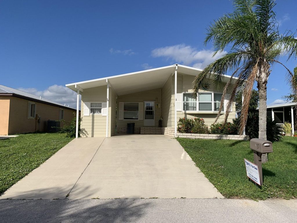 Photo of 15 Lagos Del Norte, Fort Pierce, FL 34951 (MLS # R11144436)