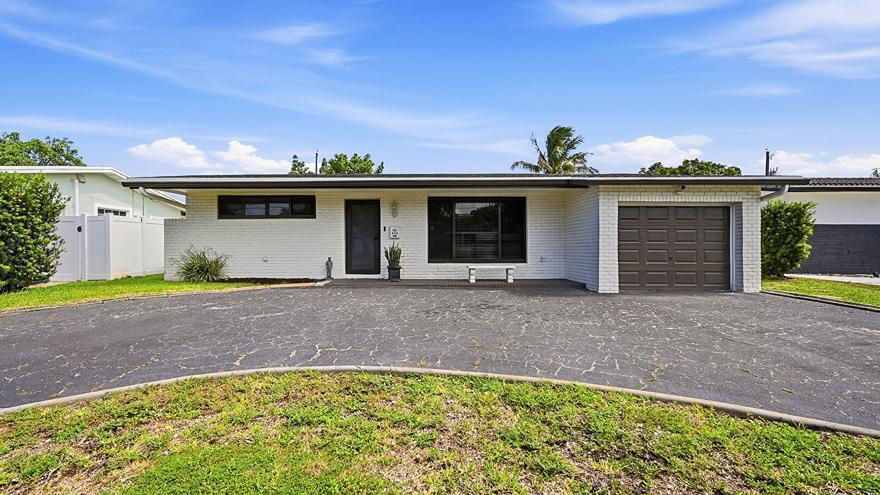 Photo of 8370 NW 26th Place, Sunrise, FL 33322 (MLS # B26043934)