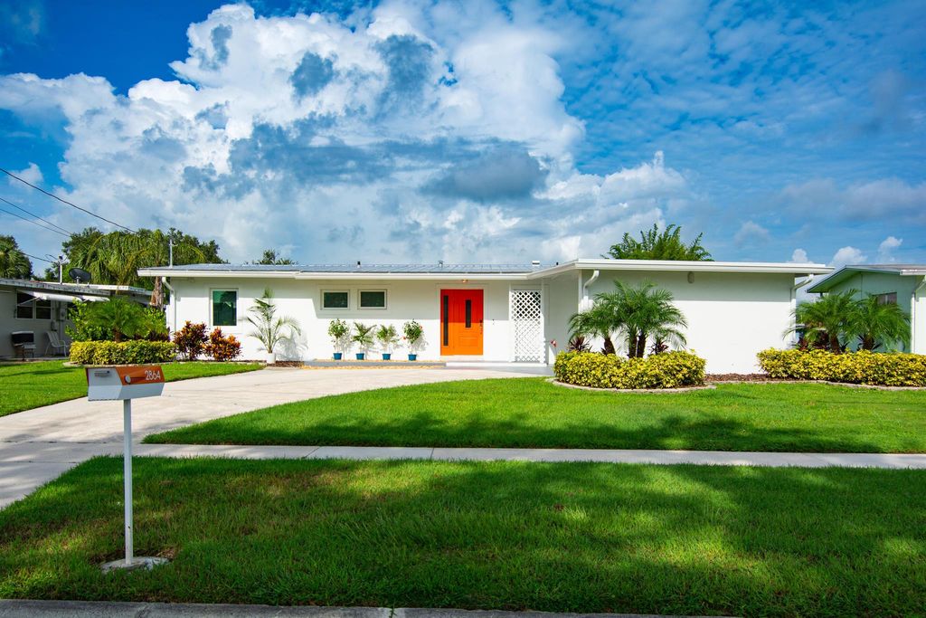 Photo of 2864 SE Treasure Island Road, Port St Lucie, FL 34952 (MLS # R10905414)