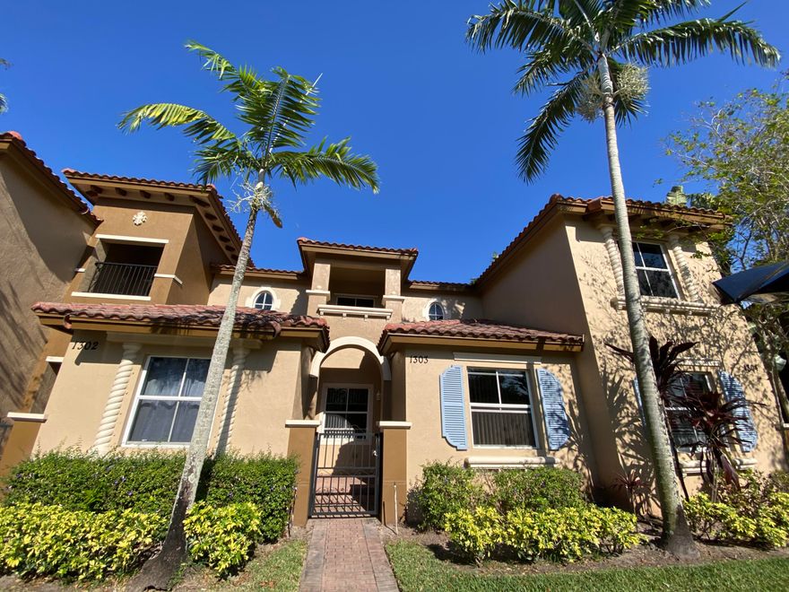 Beautiful townhouse, freshly repainted inside, new range and different updates, perfectly maintained. 2 spacious bedrooms and 2 bathrooms upstairs, living room, dining room, kitchen, laundry room and half bathroom downstairs. Backyard overlooking a preserve. 2 parking spaces assigned.  Desirable gated community of Links at Emerald Dunes, with pool, club house, hot tub, beautiful green area. Quiet, no traffic noise, gated and security patrolled, perfectly maintained community. Easy access to Turnpike, I95, shopping, restaurants and PBI airport.