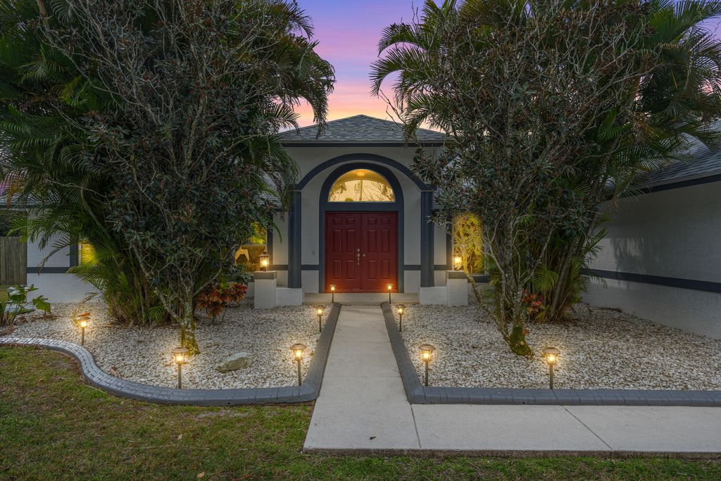 Photo of 6028 NW Winfield Drive, Port Saint Lucie, FL 34986 (MLS # R11133799)