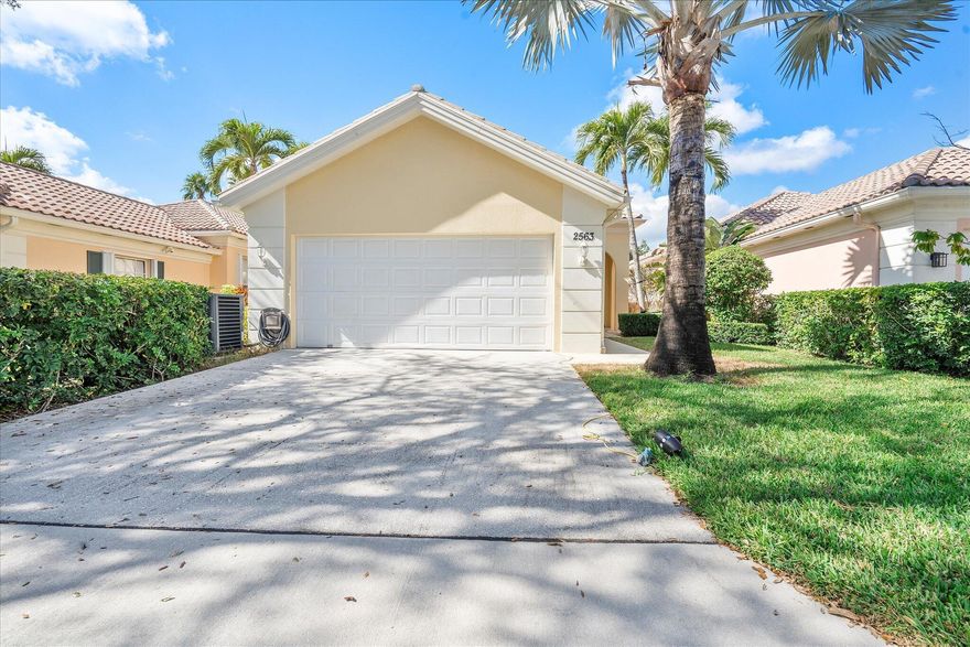 MOTIVATED SELLER !! Enjoy a beautiful WATER VIEW from this 3 bedroom, 2 bathroom, 2-car garage villa in the coveted Riverwalk community! There is tile flooring in the living area and elegant parquet in bedrooms. 10' ceilings and plenty of windows make the home feel bright and airy. The spacious primary bedroom overlooks the canal and direct access to the backyard. It is finished with a walk-in closet. The primary bathroom features dual sinks and a shower. Spacious laundry room is equipped with a full size washer and dryer, a convenient sink and plenty of storage space. Relax on a screened-in, private patio overlooking a serene canal. HOA fee covers cable and internet. Riverwalk is a fantastic community with its own Town Center, post office, three pools, café /restaurant, fitness center, eight Har-Tru tennis courts, pickleball courts, bocce court, activity rooms, 24-hr manned gate and more. It is just a few minutes away from the FL Turnpike and 441. Riverwalk is conveniently located to grocery stores and shopping plazas. Take a quick ride to I-95, PBI airport, Palm Beach Outlets, downtown West Palm Beach and Rosemary Square featuring fantastic restaurants and shops. The beach and fabulous Palm Beach Island are 12 miles away. All measurements are approximate. Take a look at the 3D virtual walk-through.