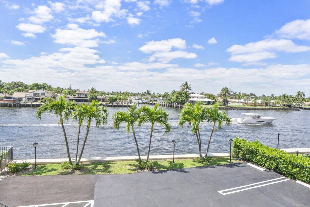 Photo of 501 N Riverside Drive #203, Pompano Beach, FL 33062 (MLS # B26017853)