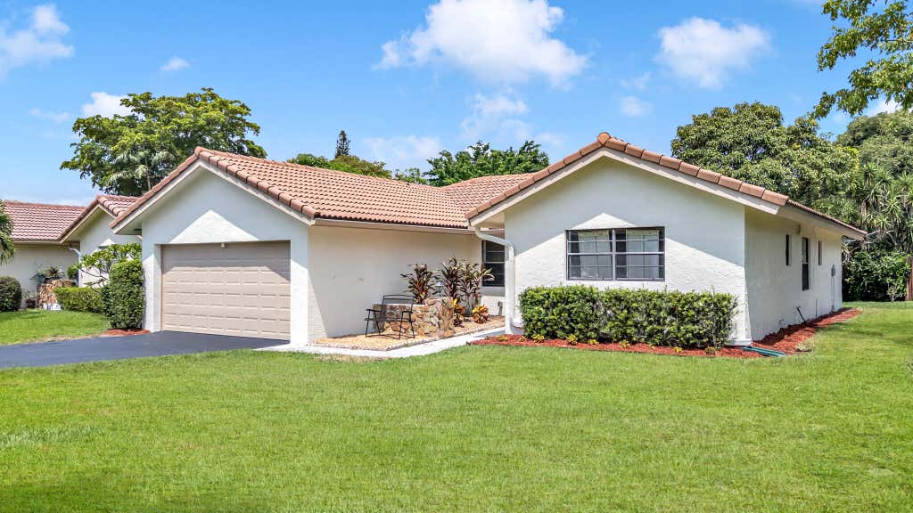 Photo of 1273 Spring Cir Drive, Coral Springs, FL 33071 (MLS # B26046027)