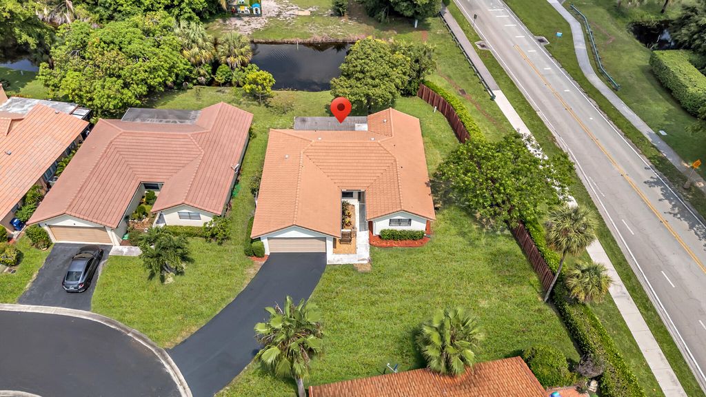 Photo of 1273 Spring Cir Drive, Coral Springs, FL 33071 (MLS # B26046027)