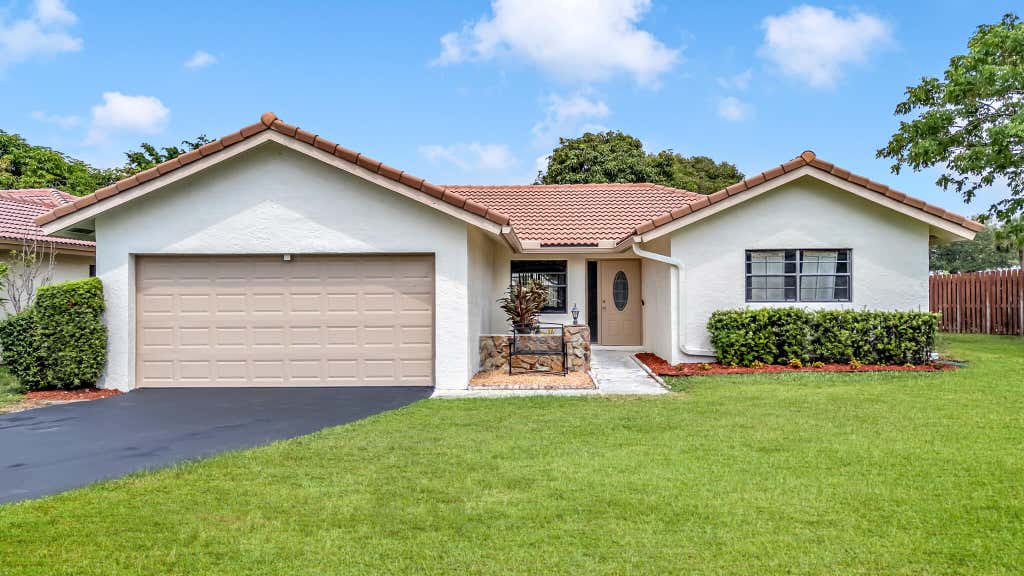 Photo of 1273 Spring Cir Drive, Coral Springs, FL 33071 (MLS # B26046027)