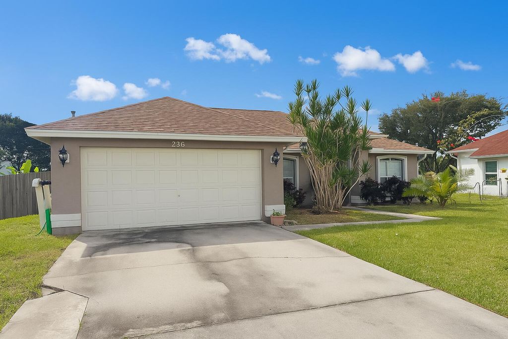 Photo of 250 SW Moselle Avenue, Port Saint Lucie, FL 34984 (MLS # R11138937)