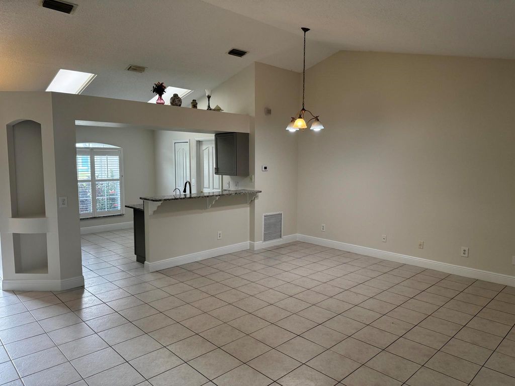 Photo of 250 SW Moselle Avenue, Port Saint Lucie, FL 34984 (MLS # R11138937)