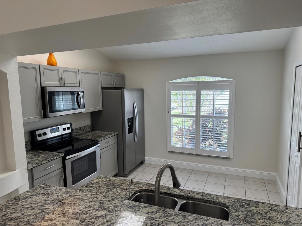 Photo of 250 SW Moselle Avenue, Port Saint Lucie, FL 34984 (MLS # R11138937)