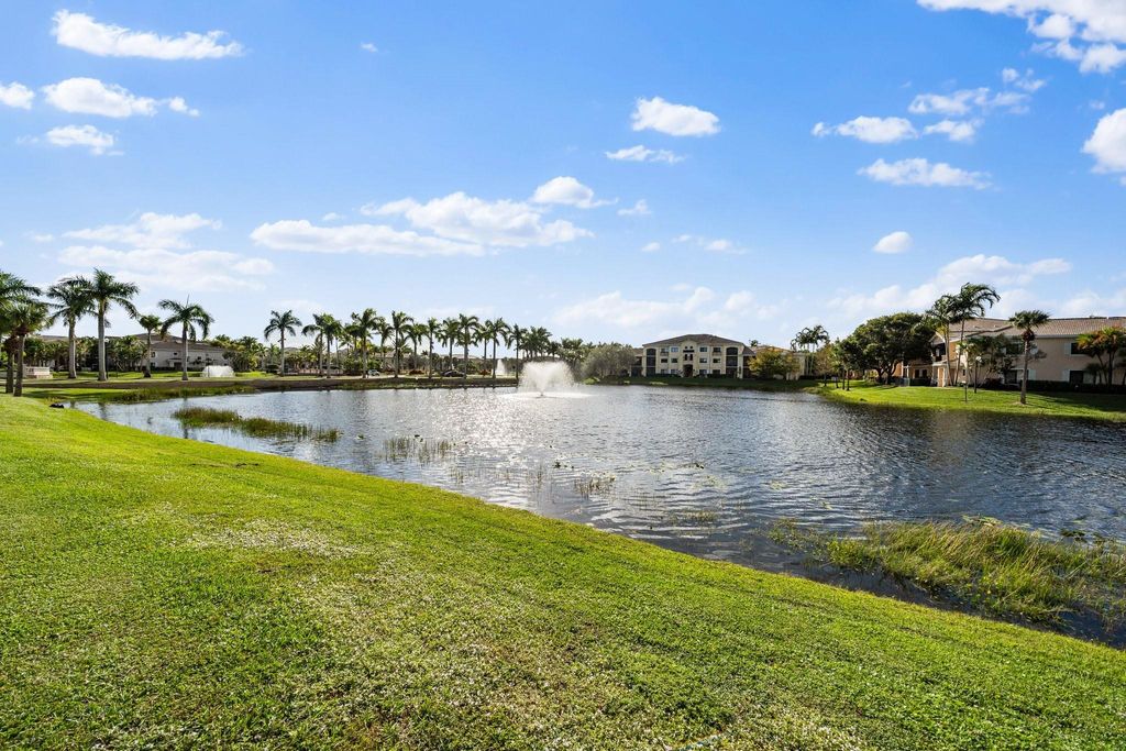 Photo of 3019 Alcazar Place #107, Palm Beach Gardens, FL 33410 (MLS # F10539346)