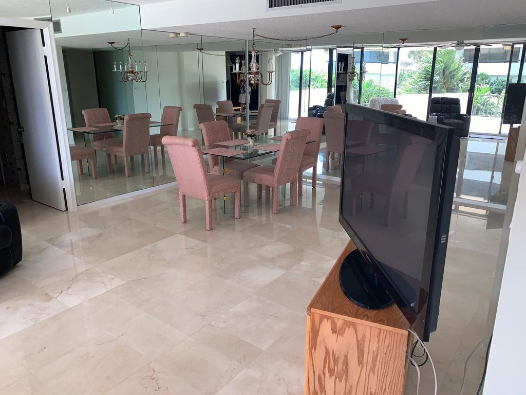 Photo of 4200 N N. Ocean Drive #103, Riviera Beach, FL 33404 (MLS # R10650635)