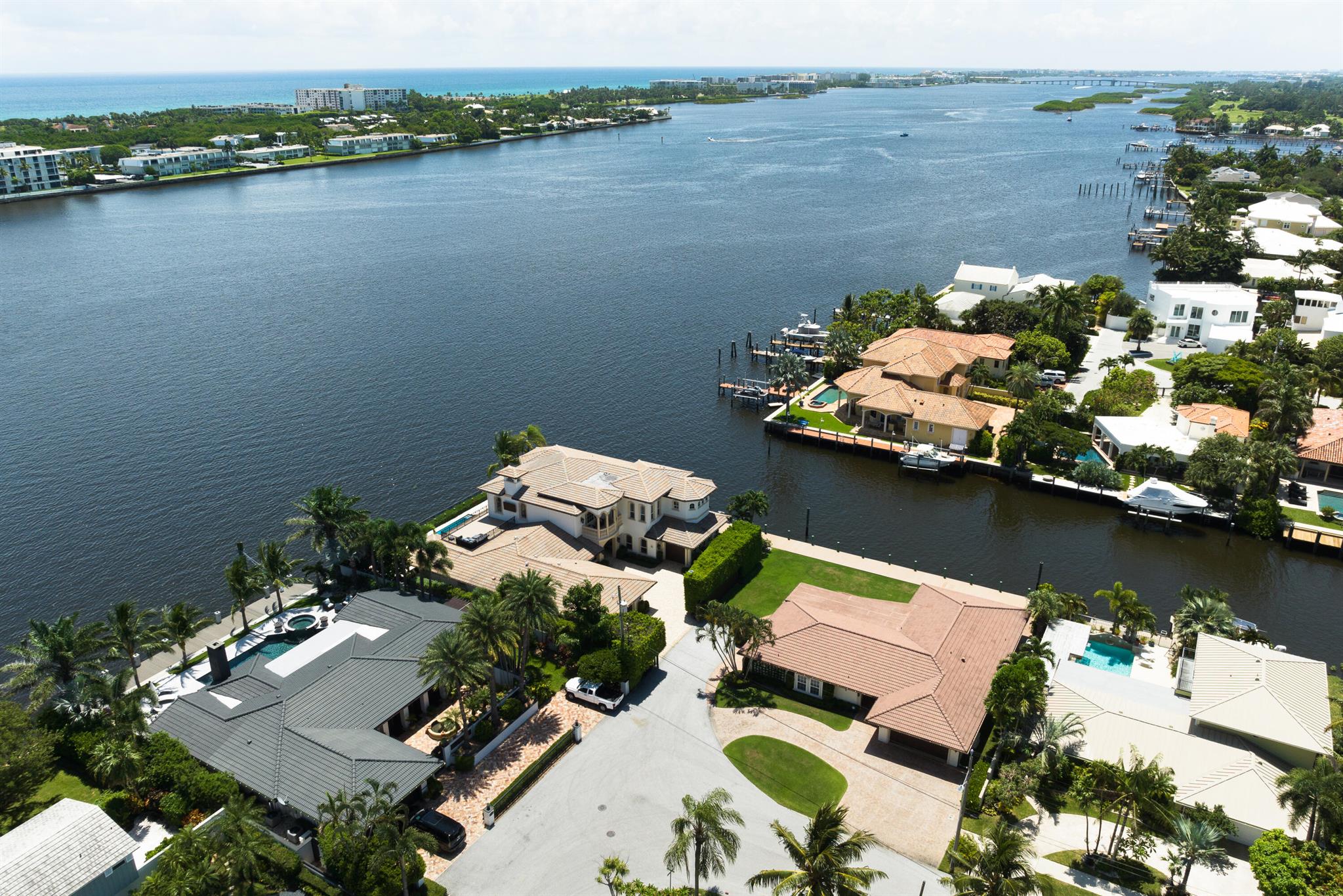 Experience direct Intracoastal living & unprecedented privacy featuring 325' of waterfront & 200' of dock 15 min to downtown, Worth Ave & PBI Offering both a primary & secondary residence with a combined 8300+ SF of living space and preferred Southeast waterfront exposure . The primary residence is host to a 17' backlit quartzite island, water's edge dining & living areas, a 5-room owners suite with panoramic vista's and an ocean-facing rooftop terrace! Reimagined, the secondary residence offers its own waterfront living areas, kitchen & pool. The estate boasts waterside kitchens & great rooms surpassed only by the 300' of coastal loggia's and an elevated dock connecting the dwellings. The primary residence also available separately. Seller offering tax incentives to qualified buyers.