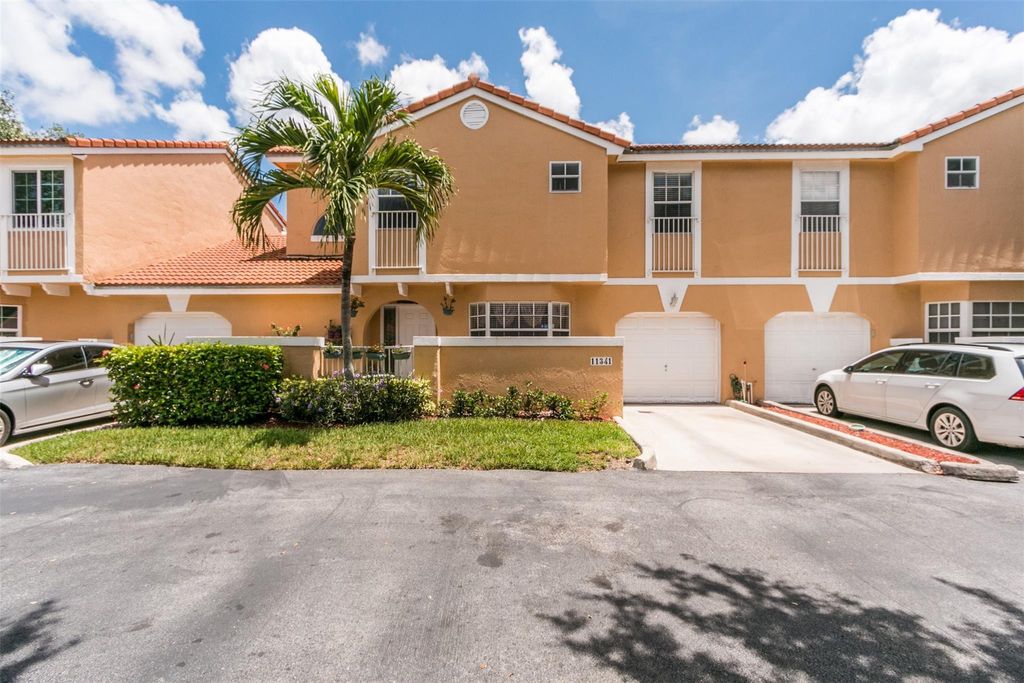 Photo of 11341 Lakeview Drive #30, Coral Springs, FL 33071 (MLS # F10414463)