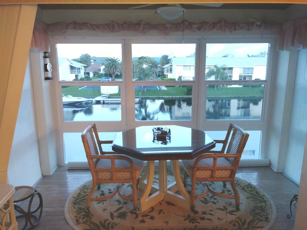 2nd floor furnished condo overlooking canal. Has two half baths with a tub/shower combo between them (Jack & Jill). Enclosed porch has been opened up to the living room with vertical blinds for privacy if desired. Water, sewer and trash included. Community pool, clubhouse and kayak storage at the end of the street behind. Terrific location between bridges and close to shopping and dining. No smoking inside unit. No pets.
Close