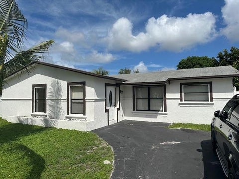 Photo of 7807 W Kimberly Boulevard, North Lauderdale, FL 33068 (MLS # B26080590)