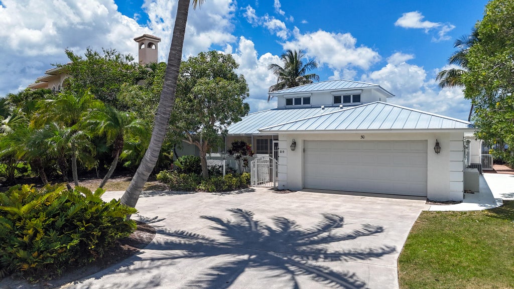 Photo of 30 SW Riverway Boulevard, Palm City, FL 34990 (MLS # R10998223)