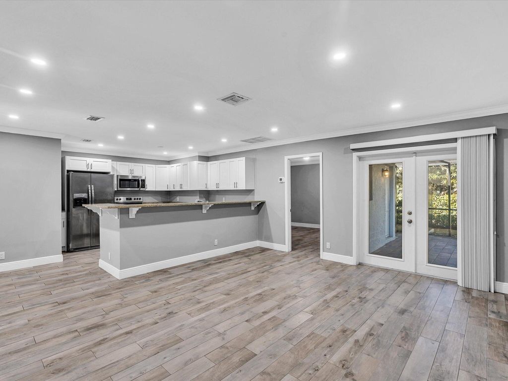 Photo of 3880 NW 79th Avenue #N-s, Coral Springs, FL 33065 (MLS # B26007540)