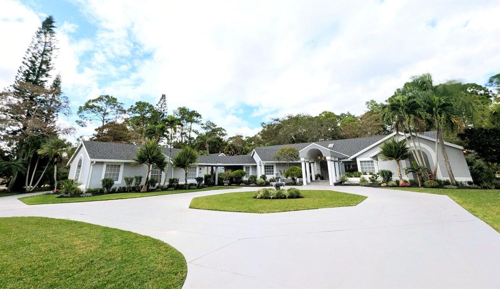 Photo of 14708 Stirrup Lane, Wellington, FL 33414 (MLS # R11148212)