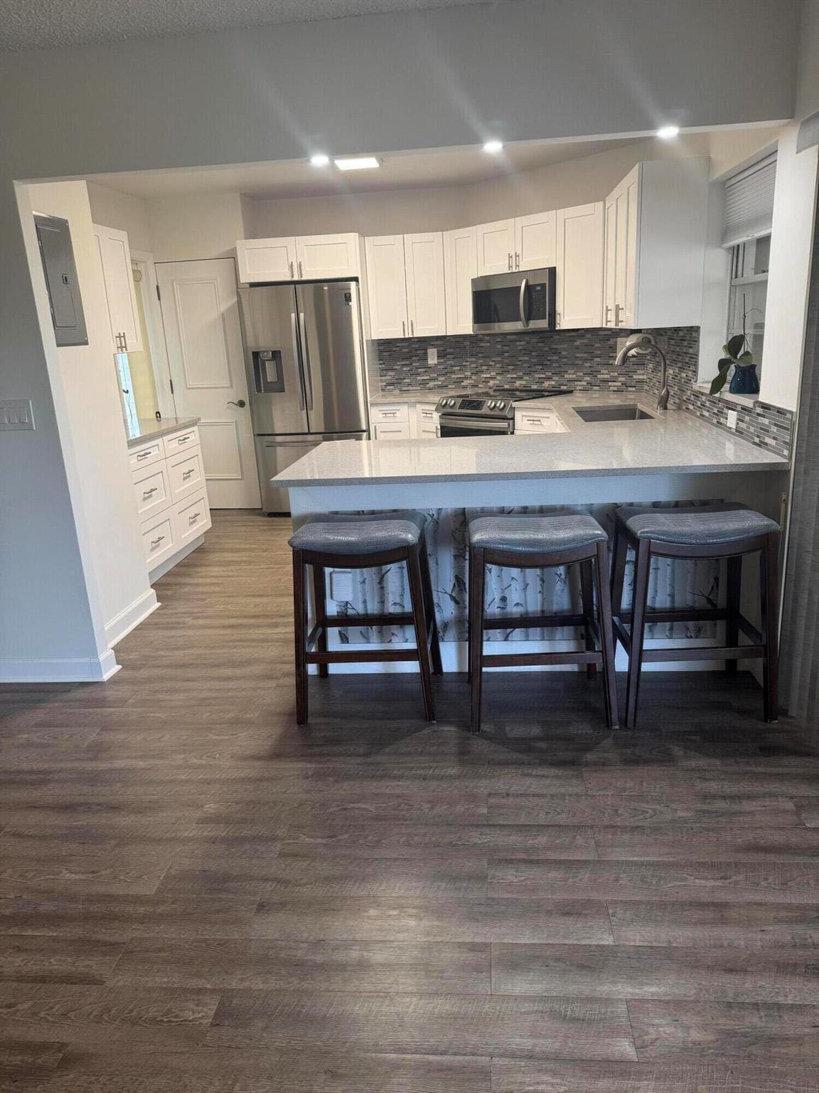 Spacious 2 bedrooms, 2 baths. This bright and spacious unit features tile flooring throughout, a remodeled kitchen with granite countertops and stainless steel appliances, and a patio perfect for morning coffee. The Condo offers a Master BR with walk-in closet, and beautiful bath. A 2nd bedroom and bath perfect for guests. Greenway Village is a well-maintained community offering a clubhouse, pool, walking paths, and laundry facilities. Ideally situated near Commons Park, shopping, restaurants, and public transportation. Annual rental includes water, cable, and exterior maintenance.