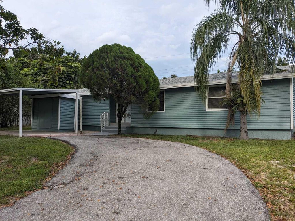 Photo of 3797 Chickasha Rd, Lantana, FL 33462 (MLS # R11043285)