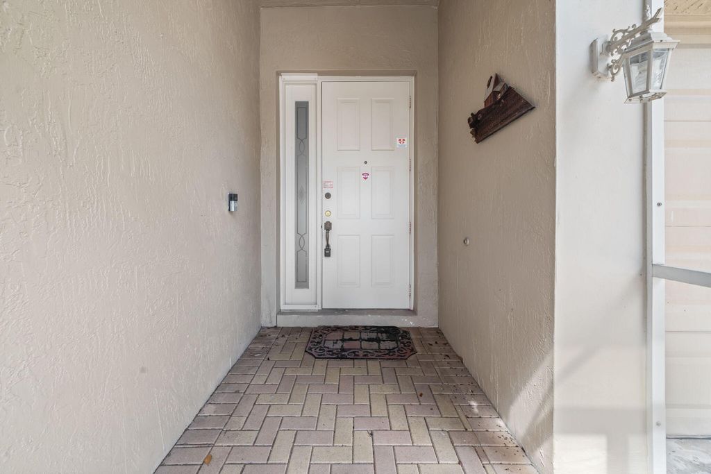 Photo of 9211 Clipper Circle, West Palm Beach, FL 33411 (MLS # B26000230)