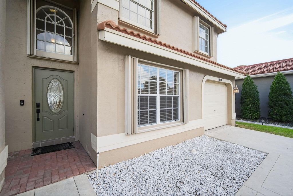 Photo of 10210 Breezeway Place, Boca Raton, FL 33428 (MLS # B26000442)