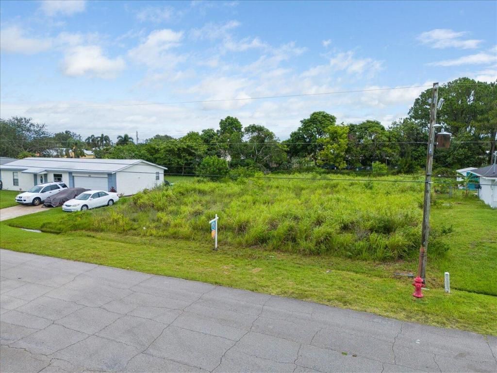 Photo of 521 SW Duval Avenue, Port Saint Lucie, FL 34983 (MLS # R11107685)