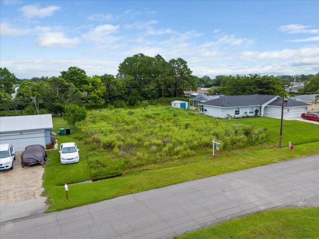 Photo of 521 SW Duval Avenue, Port Saint Lucie, FL 34983 (MLS # R11107685)