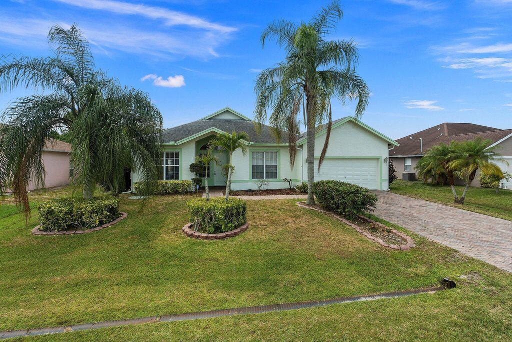 Photo of 430 SW Sadwick Avenue, Port St Lucie, FL 34953 (MLS # R10892012)
