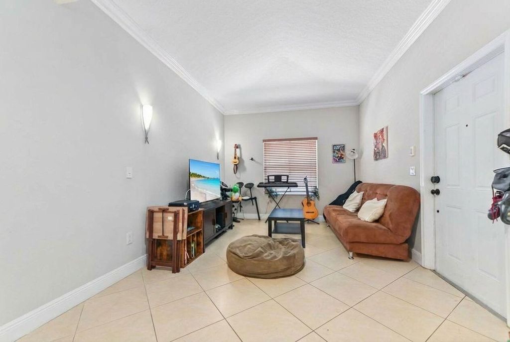 Photo of 4967 Tradewinds Terrace #605, Fort Lauderdale, FL 33312 (MLS # B26008702)