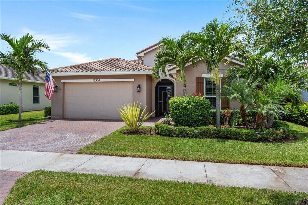 Photo of 10354 SW Ligustrum Drive, Port Saint Lucie, FL 34987 (MLS # R11107459)
