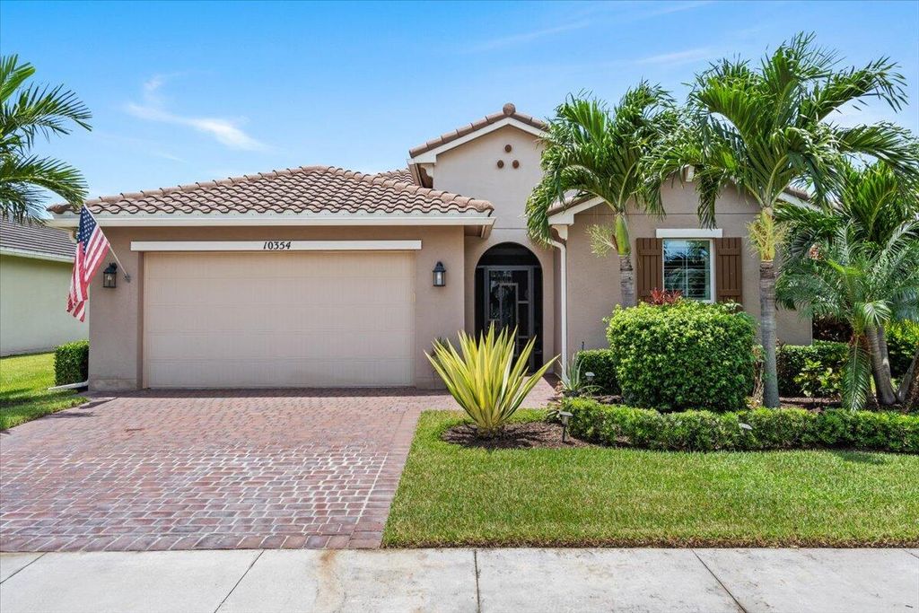 Photo of 10354 SW Ligustrum Drive, Port Saint Lucie, FL 34987 (MLS # R11107459)