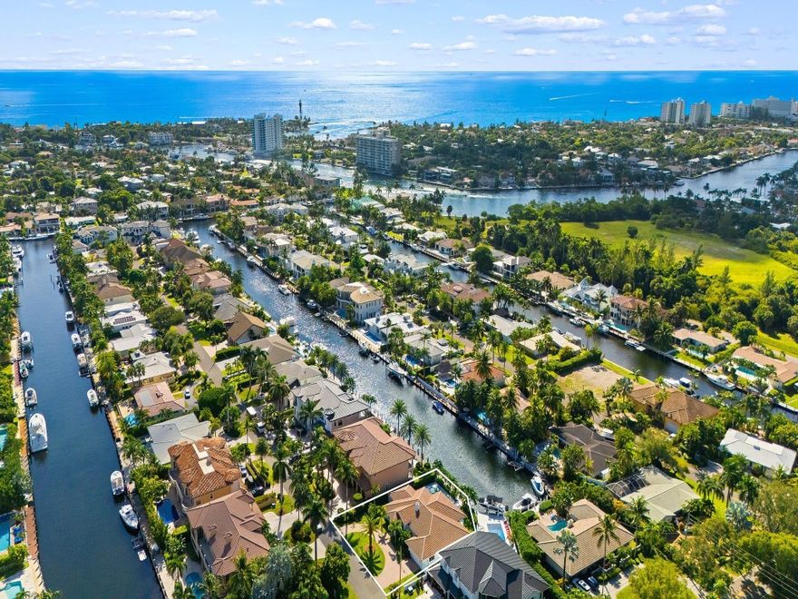 Stunning Lighthouse Point Coastal Home offering both community and waterfront lifestyles.  Step inside to discover an open concept layout with volume ceilings.   This home allows for effortless entertaining flowing seamlesly from the gourmet kitchen to the sunlit living areas.  With 4 bedrooms and 3.5 baths and sitting on a spacious 10,000+ sq ft of property,  it's a home that is as spacious as it is inviting!  Imagine waking up every day to serene waterviews and enjoying morning coffee out on the patio.    This home is complete with a brand new 20,000# boat lift and brand new dock - perfect for the sea lover.  Short boat ride to the ocean for fishing and diving.  This charming home is more than a place to live, it's a place to love!  Schedule your private showing and Let's Get You Moving!