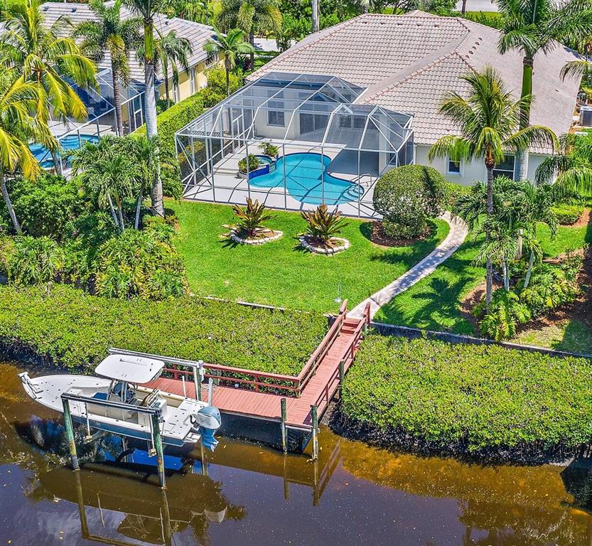 MUST RSVP FOR GATE ACCESS TO OPEN HOUSES Friday and Sat 12 to 3!! Totally Remodeled w/ Stunning Fixtures & Finishes Throughout! This Decorator Designed One Story Waterfront Home Is Located In The Exclusive Gated Community Loxahatchee Pointe. Some Features Include 4 Bedrooms Plus Office, 3 Full Bathrooms, 3 Car Garage, Screened In Patio w/ Covered Lanai, Custom Pool & Spa, Impact Glass Doors, Beautiful Wood Floors, 95Ft Of Waterfrontage w/ No Fixed Bridges, 9,000Lb Boat Lift, Nice Size Yard, Gourmet Kitchen w/ Large Island, Gas Stove & Quartz Counter Tops, Butler Pantry w/ Wet Bar, NEW Roof 2021, Open / Split Floor Plan w/ Cathedral Ceilings & Plantation Shutters, Cabana Bath, Crown Molding, Epoxy Garage Floor, Paver Driveway, LOW County Taxes, A Rated Schools, Community Tennis