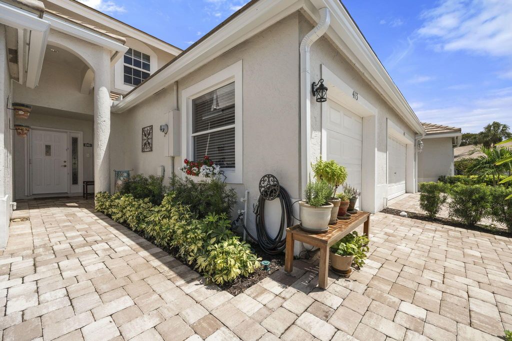 Photo of 413 Coral Cove Drive, Juno Beach, FL 33408 (MLS # R10910431)