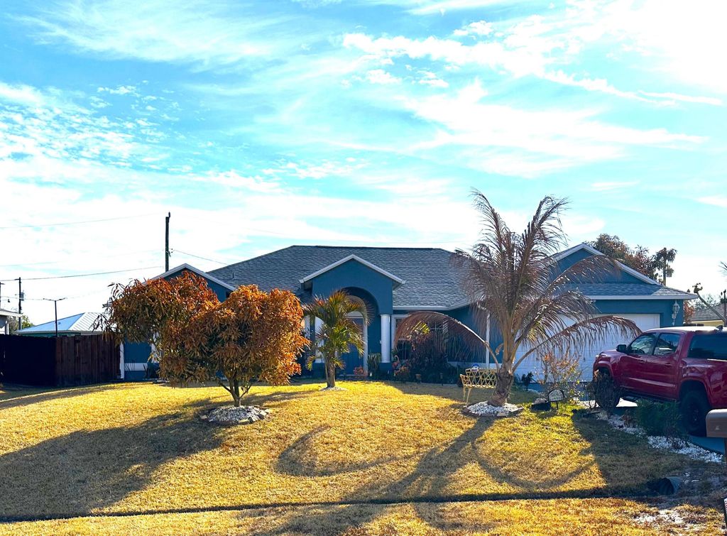 Photo of 4239 SW Callicoe Street, Port Saint Lucie, FL 34983 (MLS # R11163063)